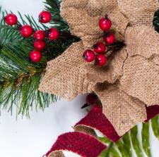 BURLAP POINSETTIA AND RIBBON SPRAY WITH RED BERRIES AND GREE
